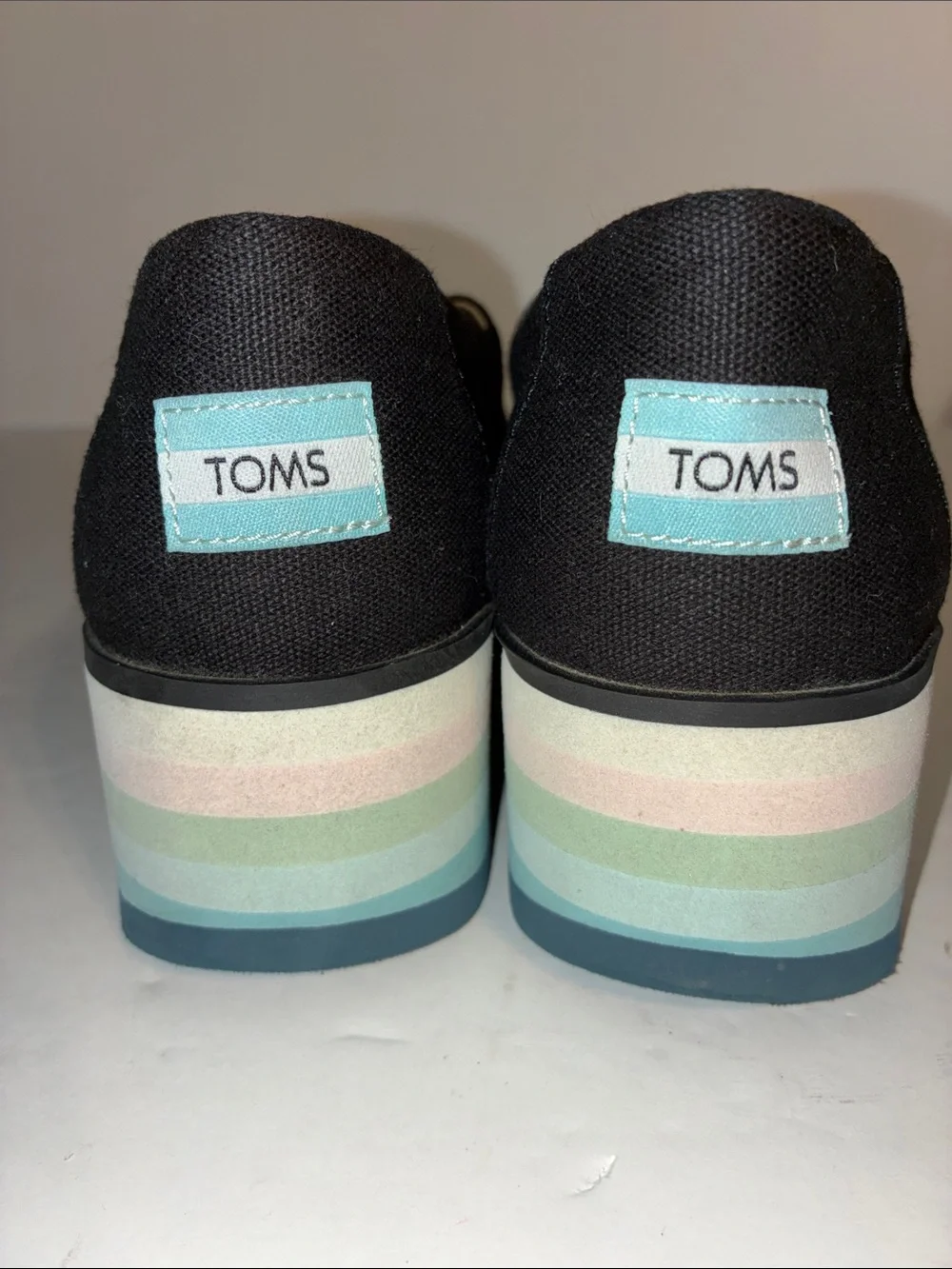TOMS, Women’s 8.5, Black Canvas Platform Slip-Ons with Pastel Striped Sole